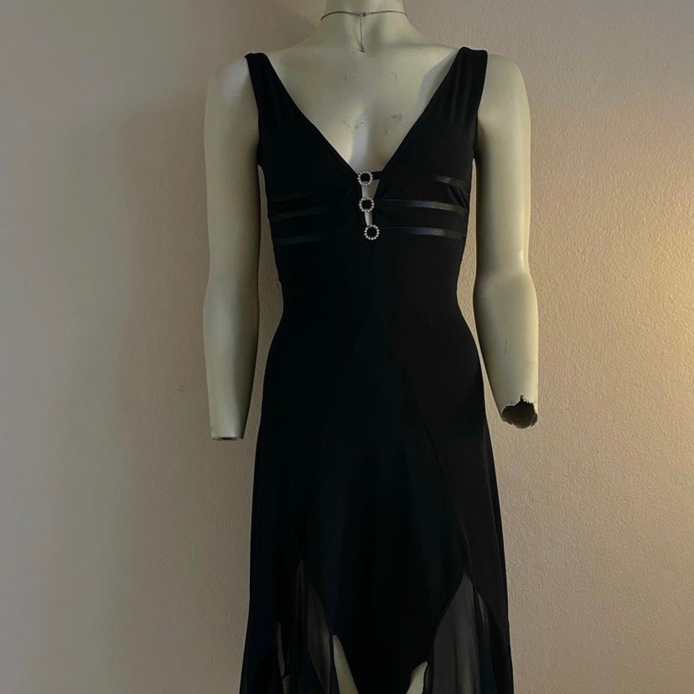 LULY K NYC knee length, distressed black dress.